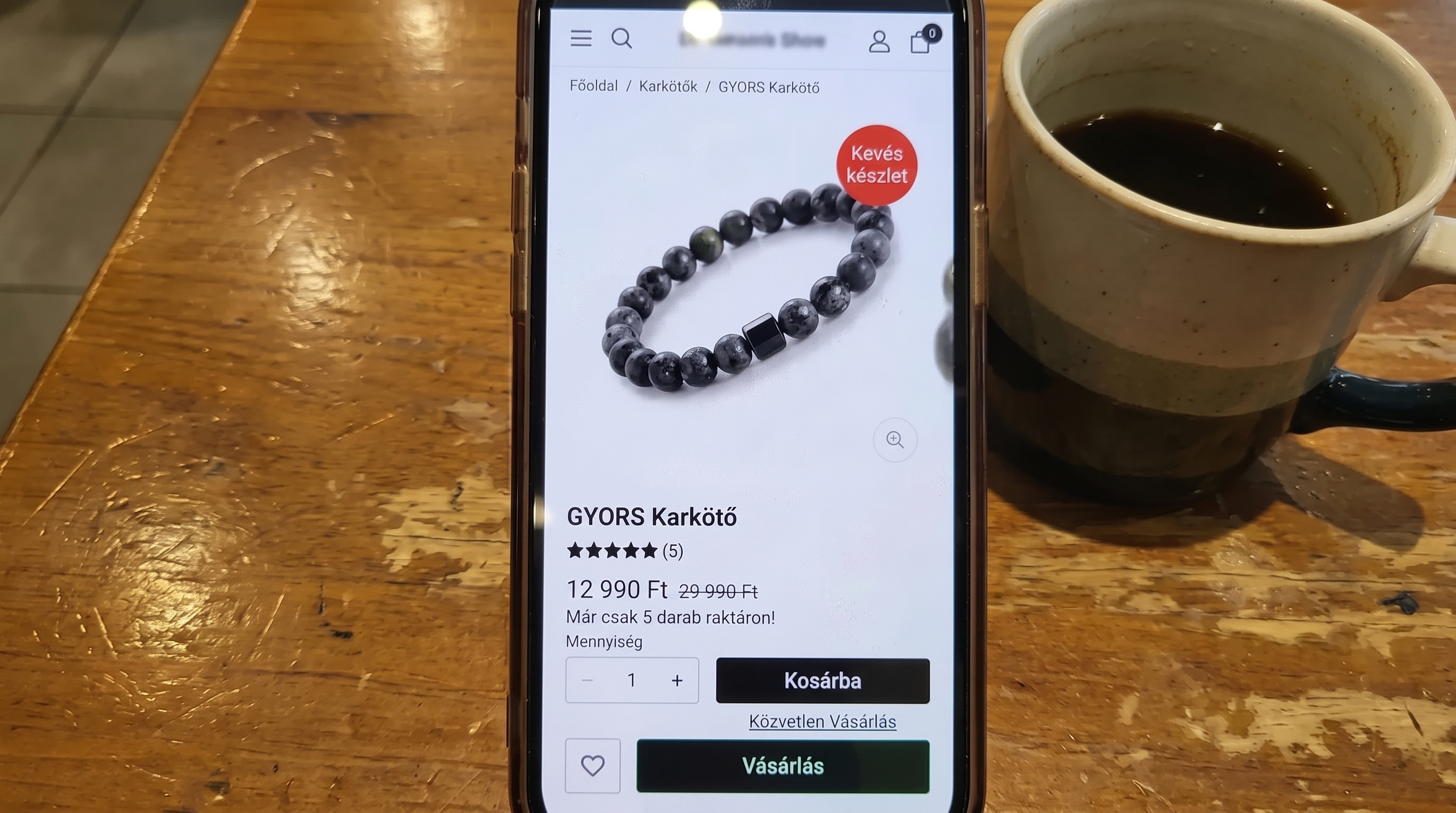 Telefon ze stroną produktu: informacja o niskim stanie magazynowym i cena w złotych